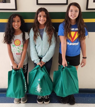 First Coast kids with bags of weekend food