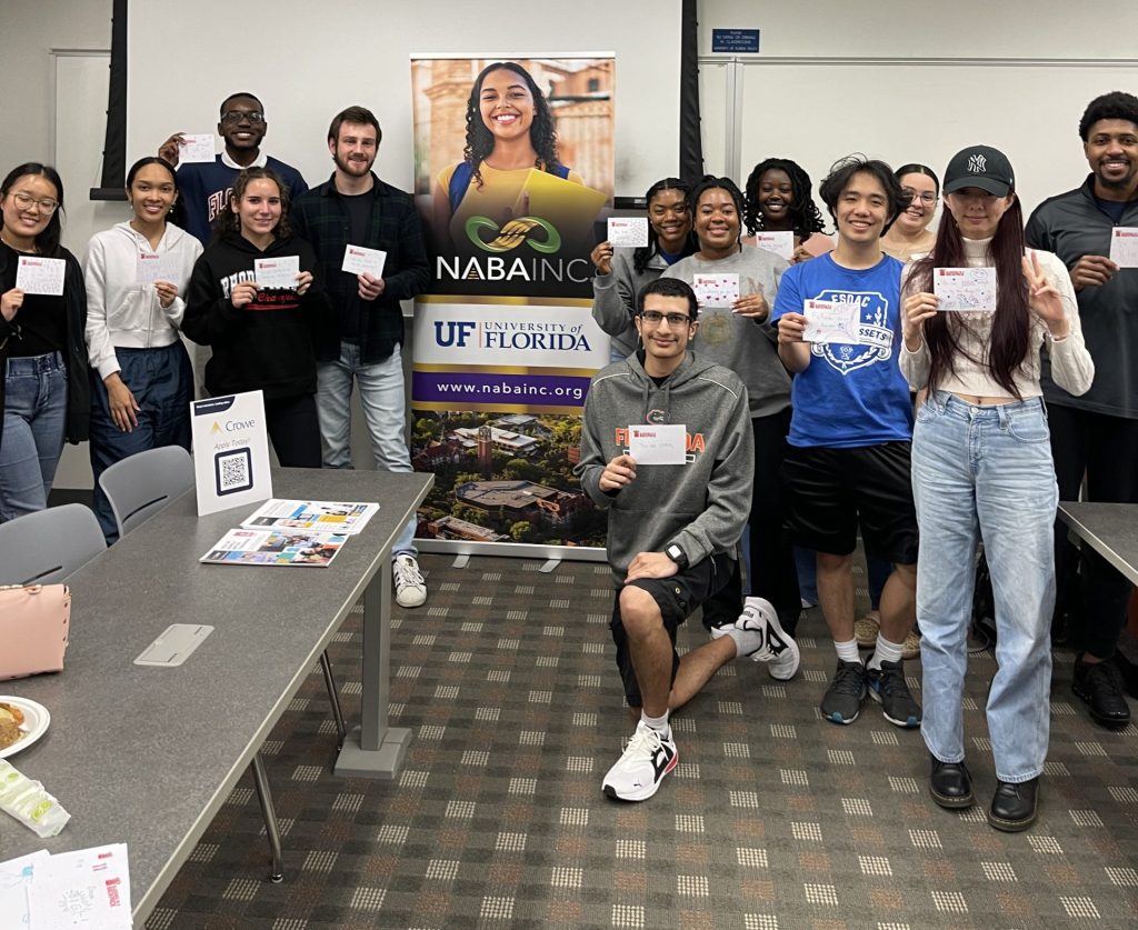 College students from the University of Florida's National Association of Black Accountants, led by Jasmine Crockett, secured a donation from Crowe LLP to provide extra food bags and handwritten notes to students at Swimming Pen Elementary School over spring break.